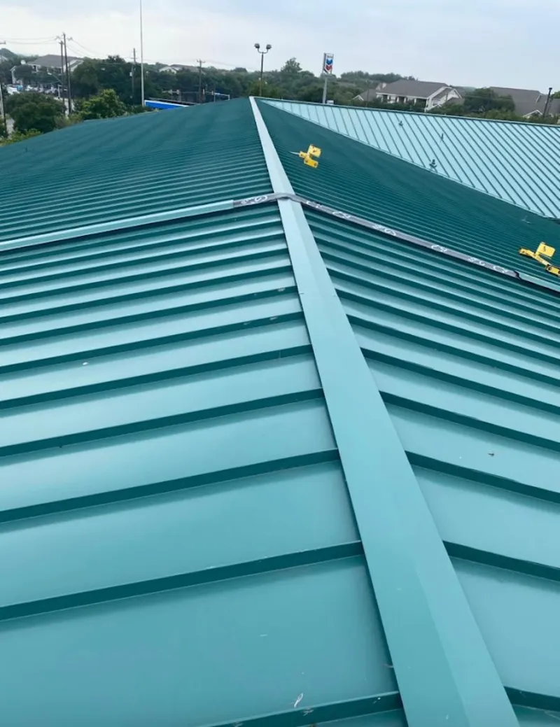 Green commercial metal roof ridge and valley for Metal Roof Repair in Brent